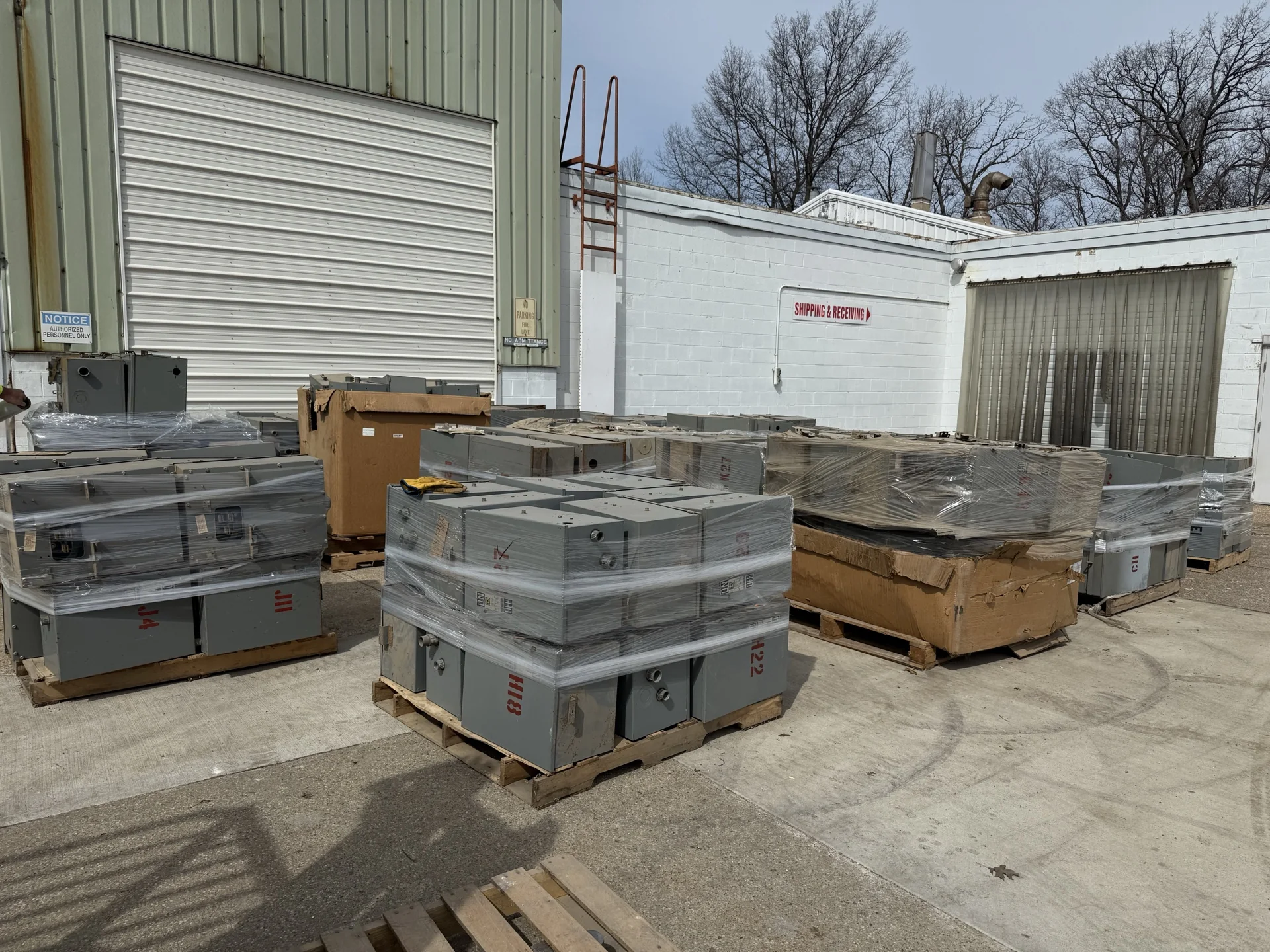 Palletized bus plugs staged at shipping and receiving