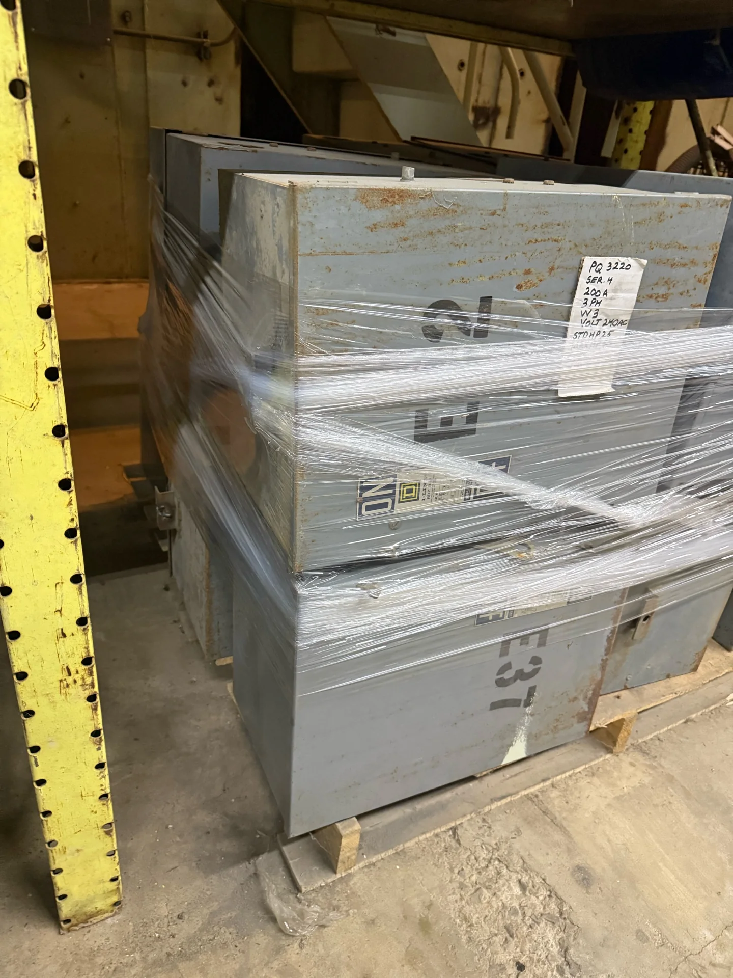 Square D bus plugs wrapped and staged on pallets